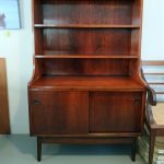 Nordic bookcase in rosewood, designed by Johannes Sorth. Nordic furniture in Porto. Vintage furniture in Porto. Furniture restoration in Porto.